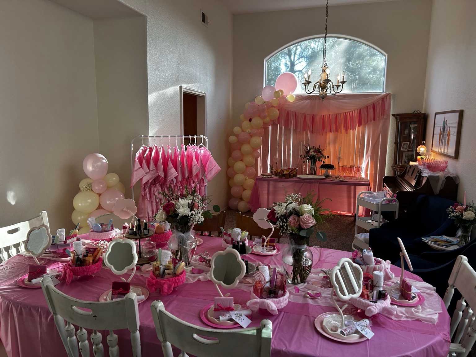 Pink spa party tables and backdrop