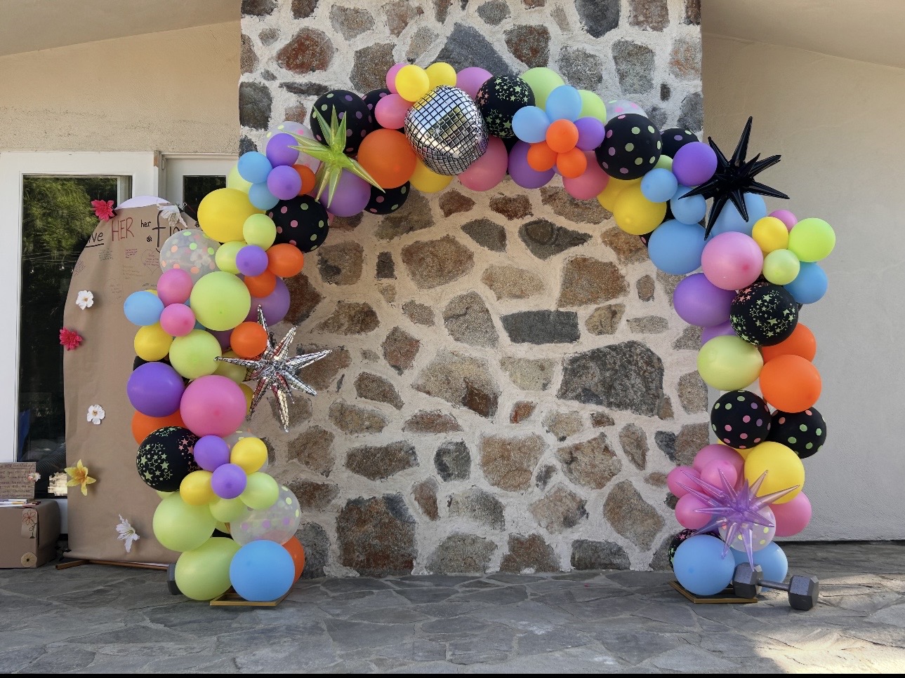 Colorful statement balloon arch