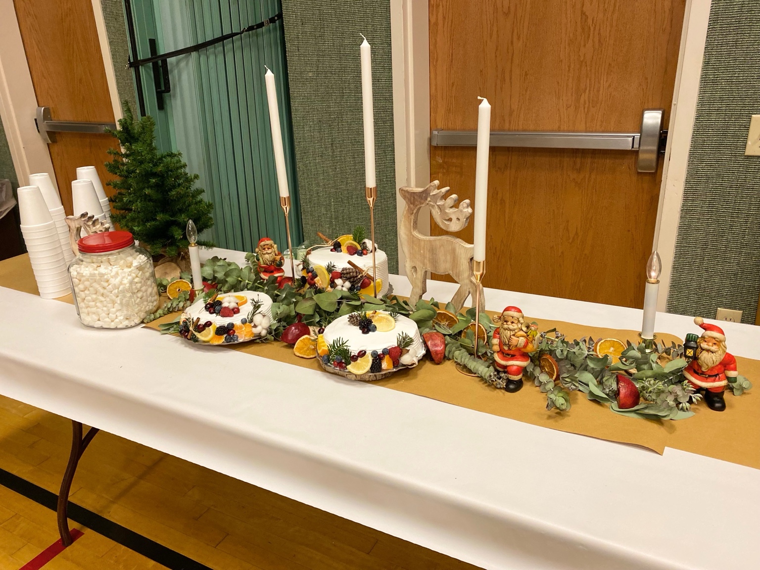 Holiday dessert table with botanical styling