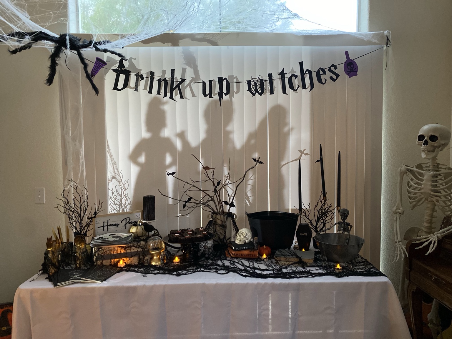 Halloween witches' beverage and dessert display