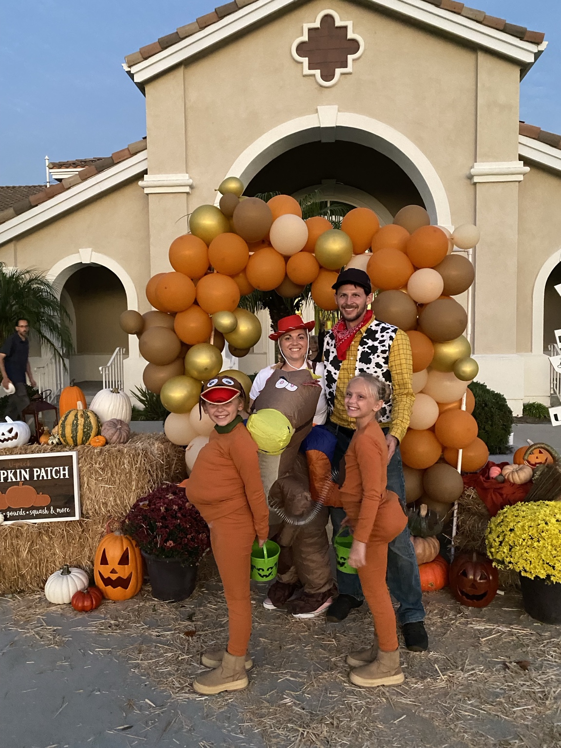 Harvest balloon arch and pumpkin display