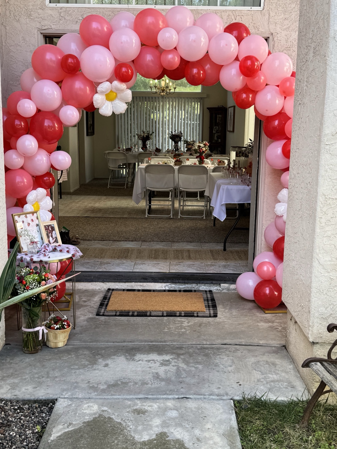 Pink and red floral balloon entrance