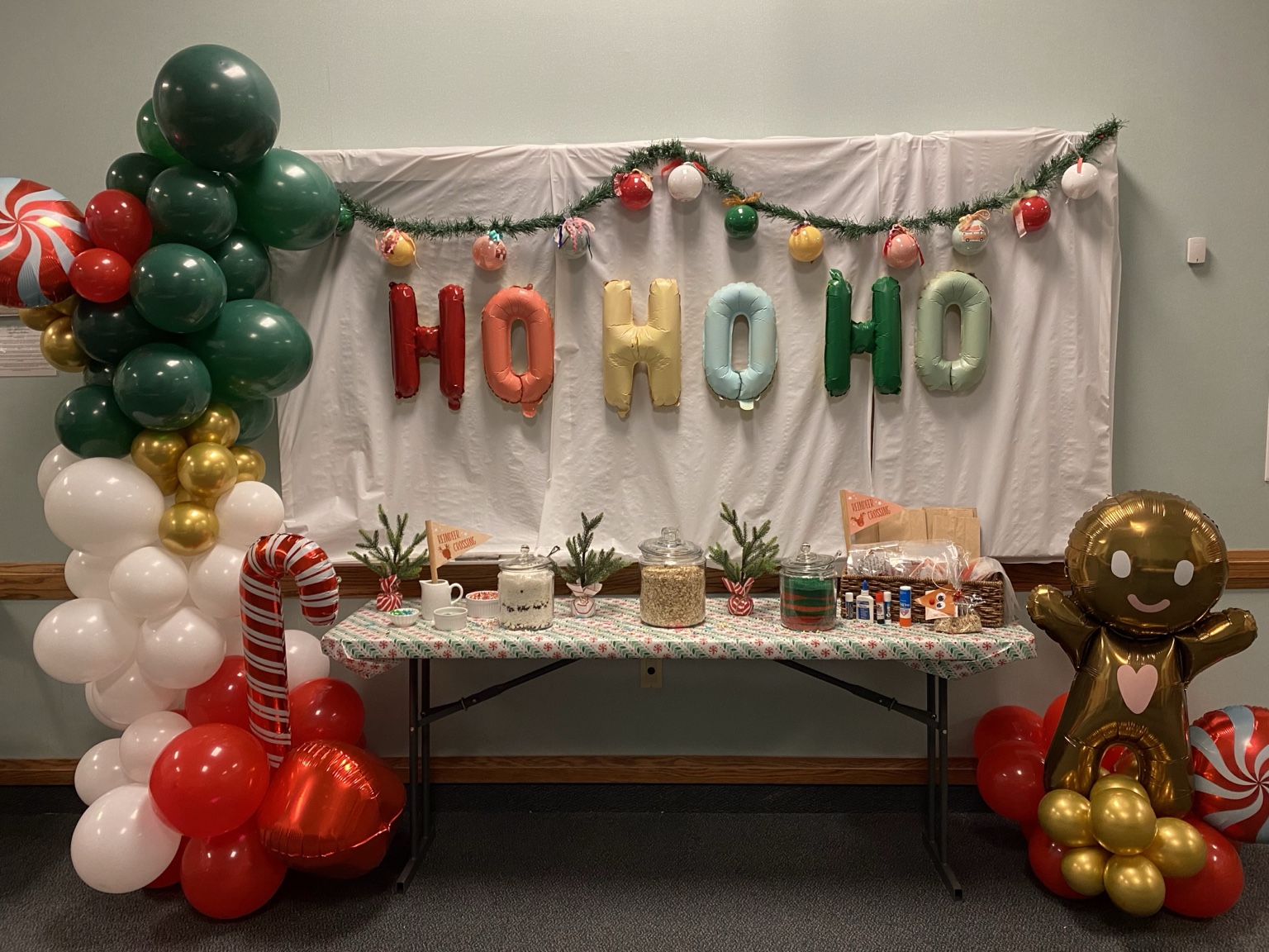 Christmas balloon and cookie-decorating station