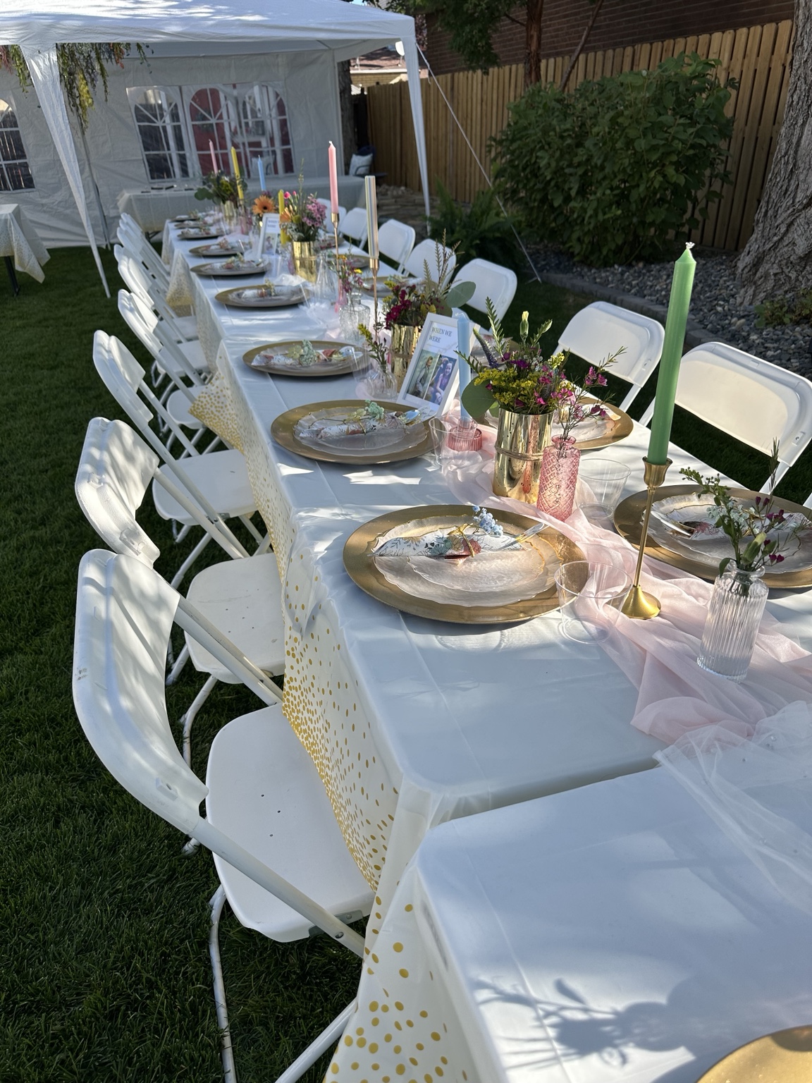 Colorful floral table setting with gold and pastel accents