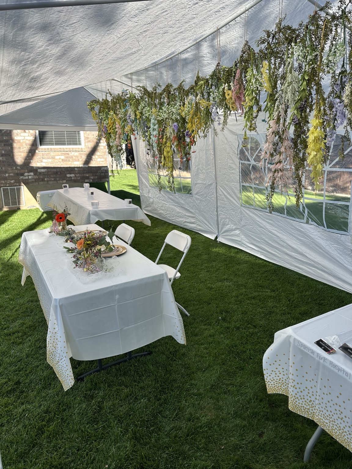 Suspended garden-style floral installation